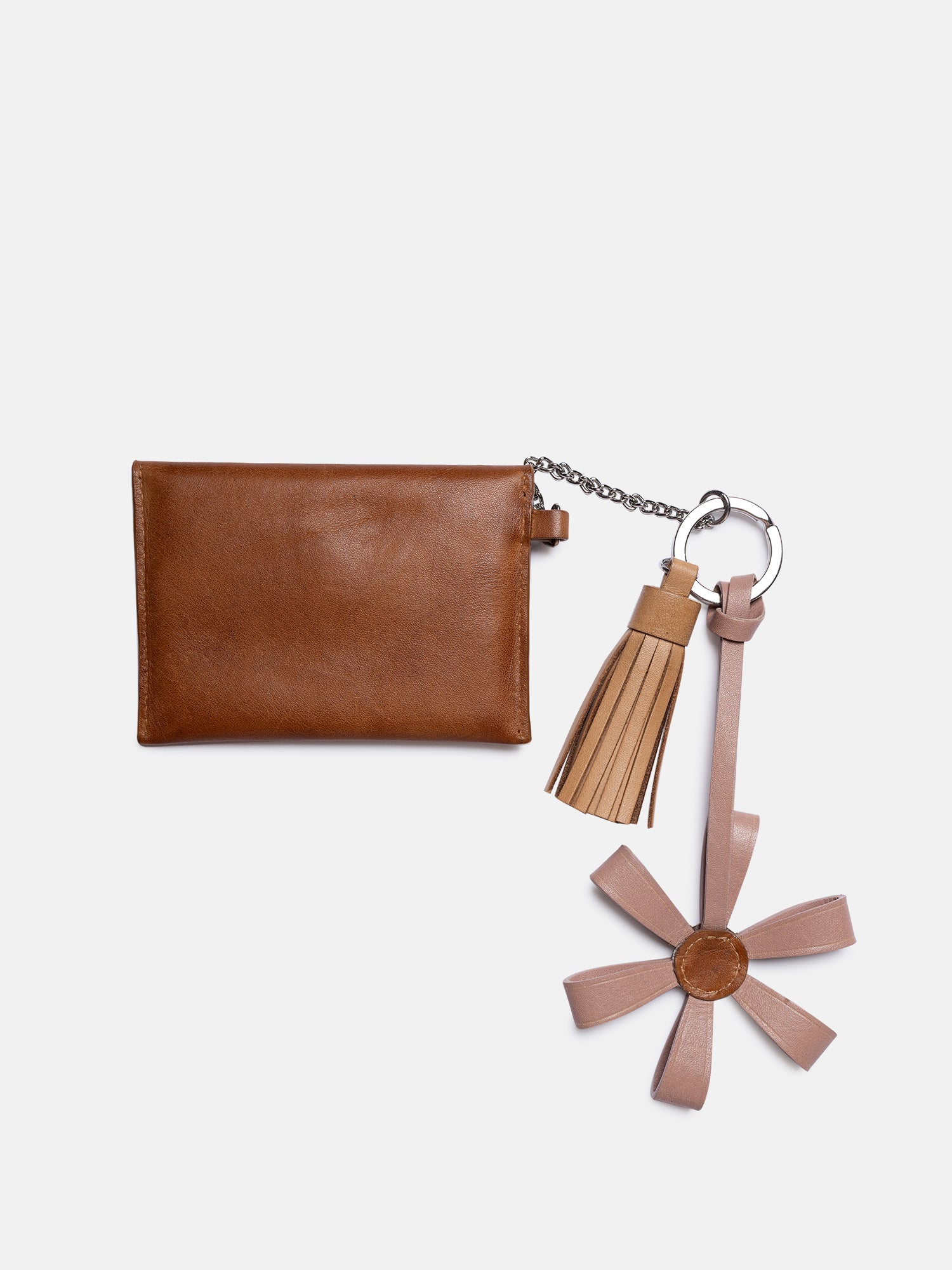 RE:DESIGNED EST 2003 Nela Keyhanger Tan